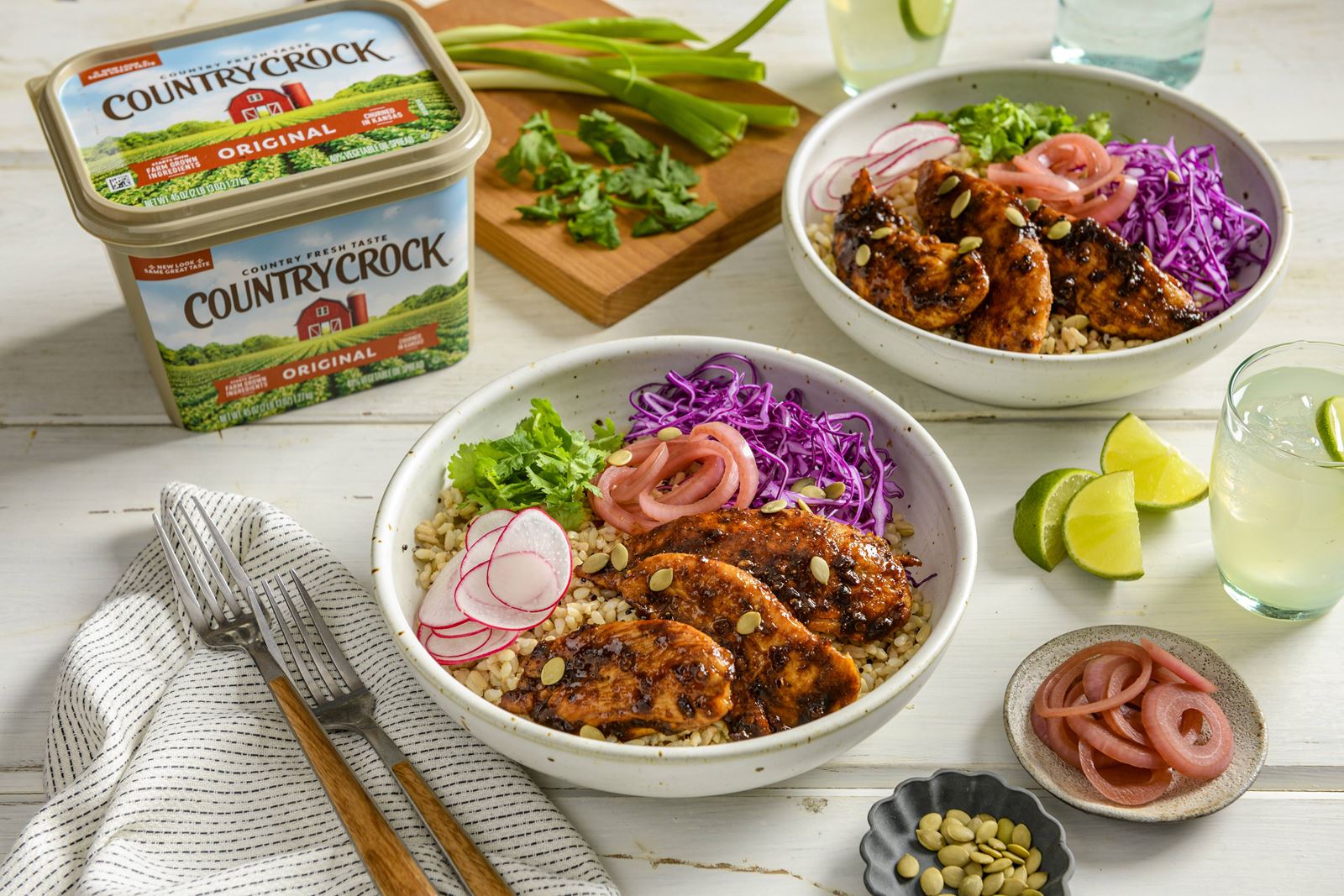 recipe image Sticky Chipotle Chicken Grain Bowls with Pickled Red Onions and Pumpkin Seeds