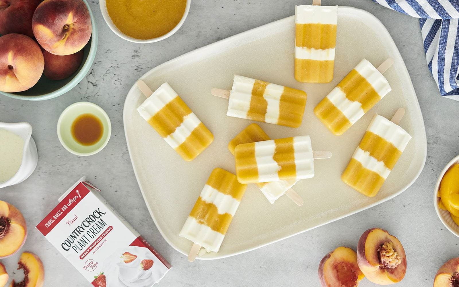 recipe image Peaches and Plant Cream Popsicles