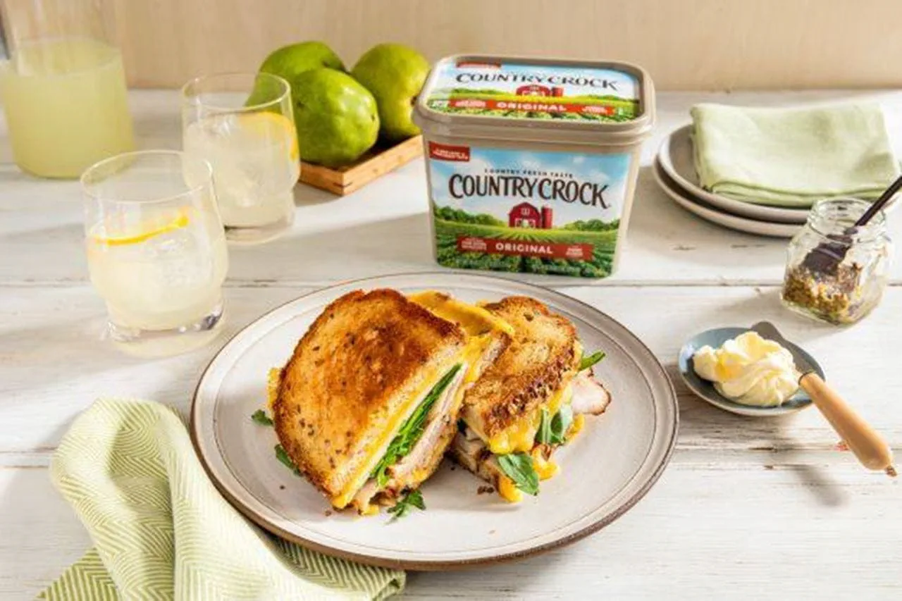 recipe image Turkey Grilled Cheese with Gouda, Arugula, and Pear
